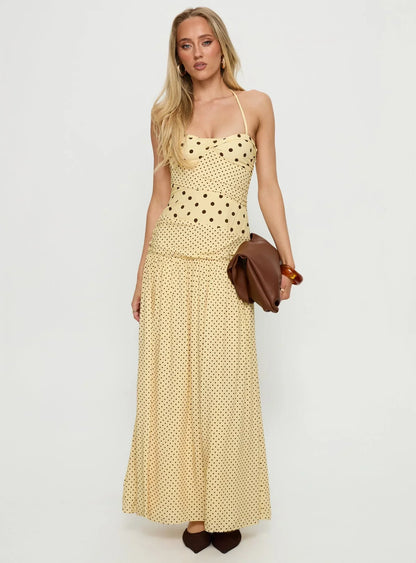 Yellow Polka Dot Halter Prom Dress with Sweetheart Neckline and Flowy Maxi Skirt for Formal Events and Prom Nights