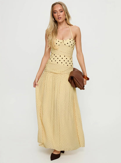 Yellow Polka Dot Halter Prom Dress with Sweetheart Neckline and Flowy Maxi Skirt for Formal Events and Prom Nights