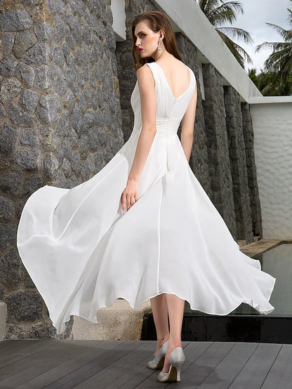 Side view of the asymmetrical A-line beach wedding dress, highlighting the ruched side-draped detail.