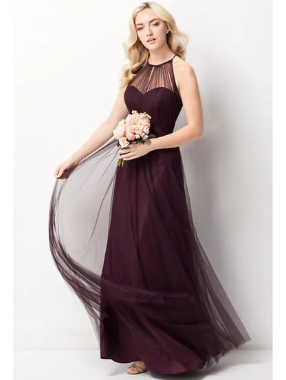 Back view of a model in an A-Line halter neck bridesmaid dress.