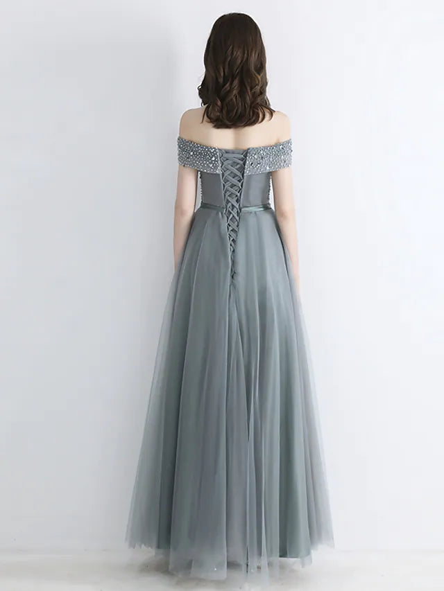 Side view of short A-Line dress with cascading ruffles.