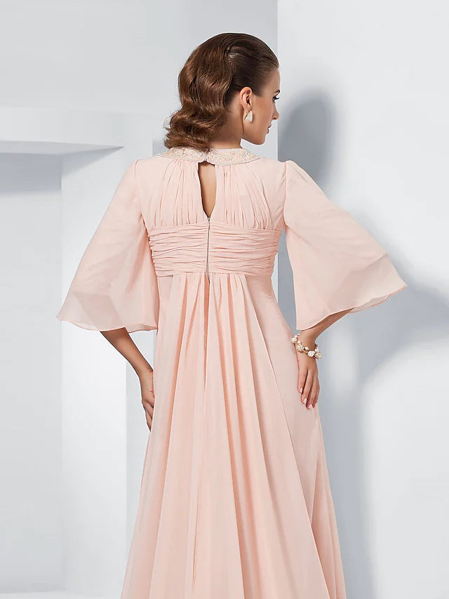 Side view of a woman wearing an A-line jewel neck dress with half sleeves.