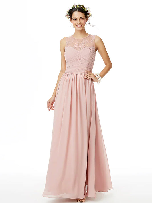 Woman wearing an elegant A-line jewel neck floor-length lace and chiffon bridesmaid dress with pleats.
