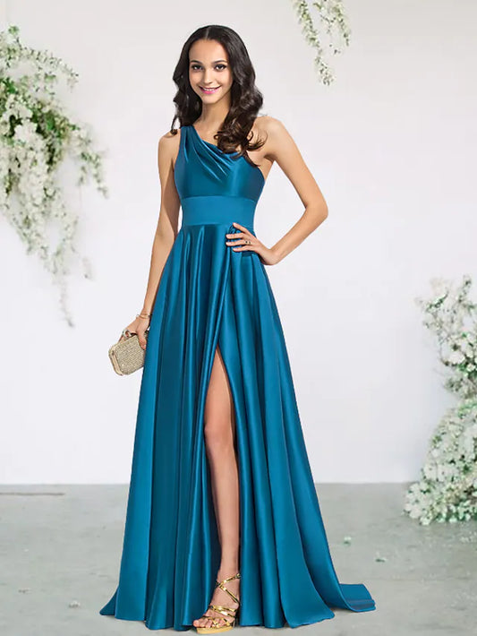 Woman wearing an elegant A-line one-shoulder bridesmaid dress with pleats and a split front.