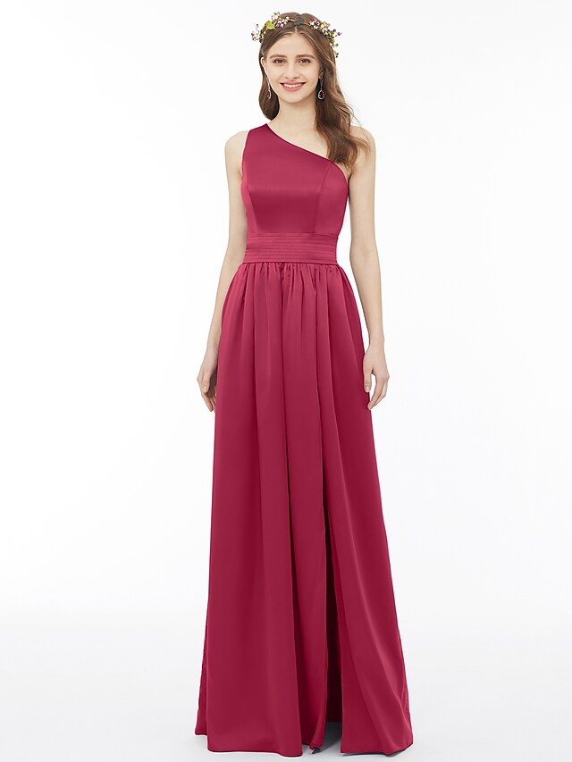 Close-up of the one-shoulder and pleated bodice of the chiffon dress.