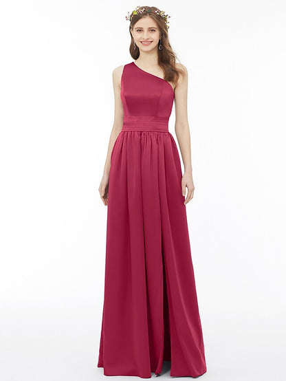 Close-up of the one-shoulder and pleated bodice of the chiffon dress.
