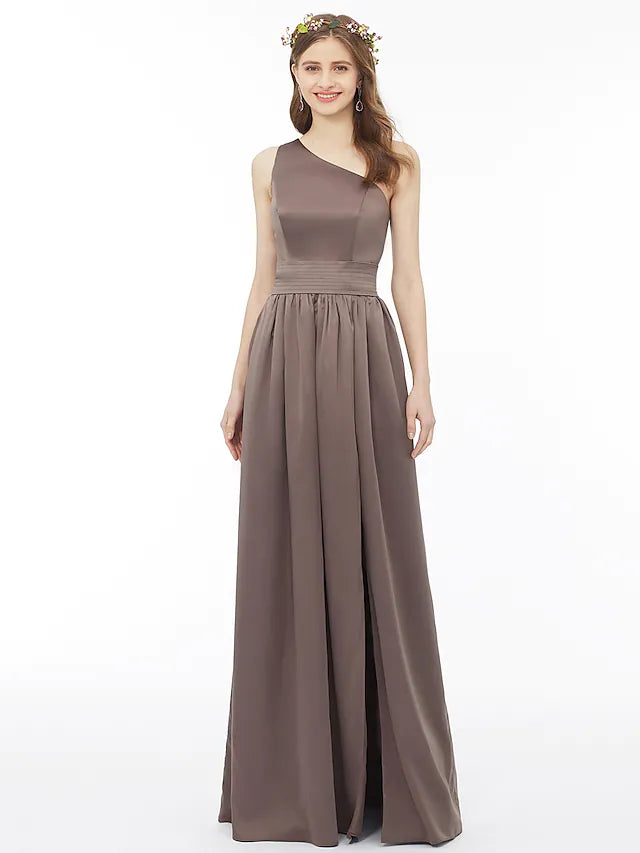 Model posing in the one-shoulder bridesmaid dress with flowing skirt.