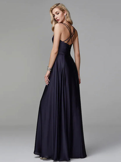 Back view of the A-line satin gown, showing beaded crisscross straps.