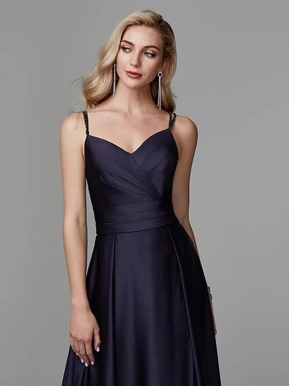 Side view of the floor-length A-line satin dress with side draping.