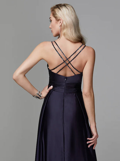 Front view of the A-line satin gown, highlighting spaghetti straps.