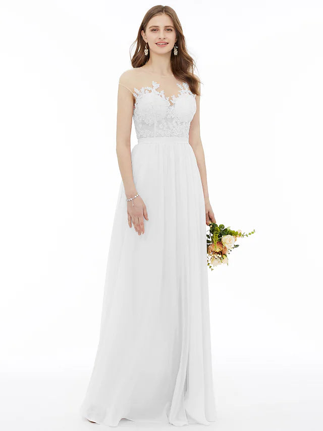 Close-up of floral lace appliques and a sash on the bridesmaid dress.