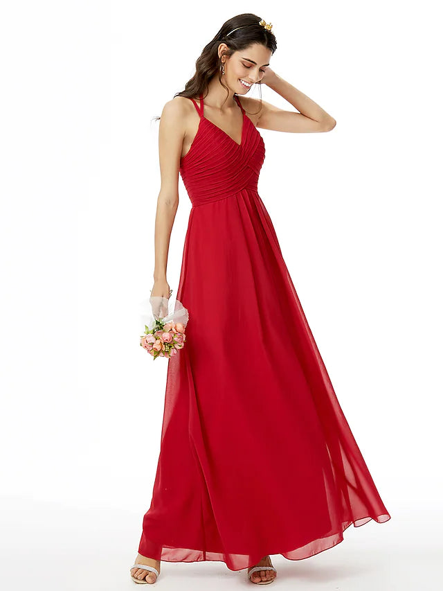 Model wearing an elegant spaghetti strap chiffon bridesmaid dress.