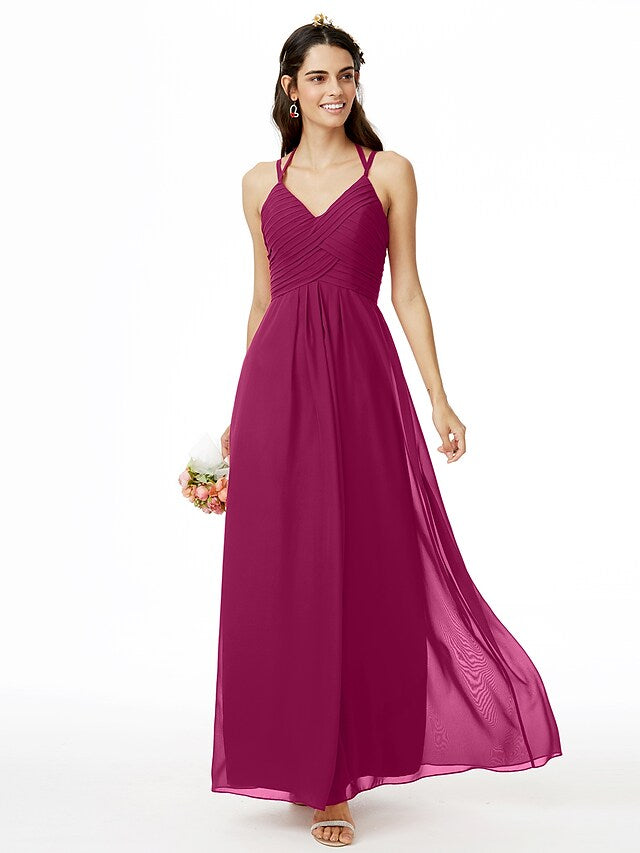 Side profile of a model showcasing the flowing chiffon fabric.