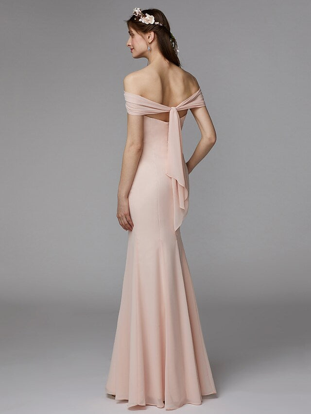 Back view of a strapless backless floor-length chiffon bridesmaid dress.