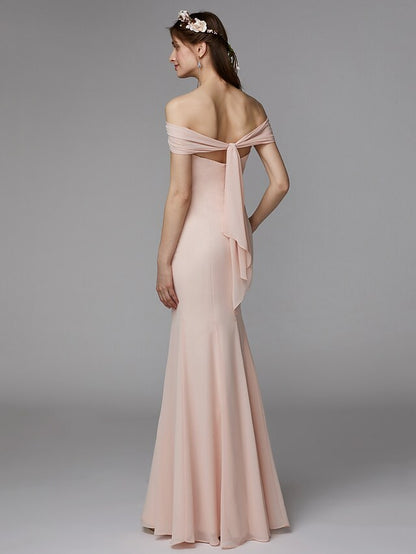 Back view of a strapless backless floor-length chiffon bridesmaid dress.