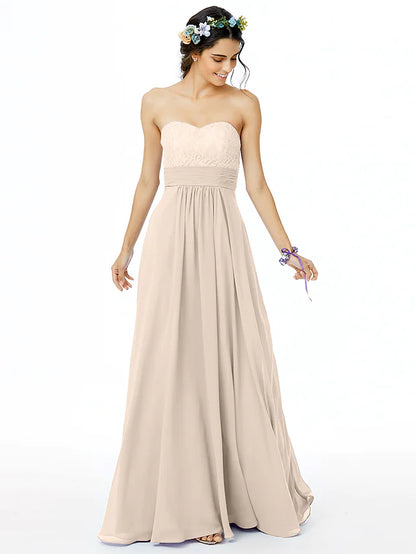 Floor-length A-Line gown featuring a ruched bodice and ribbon sash.