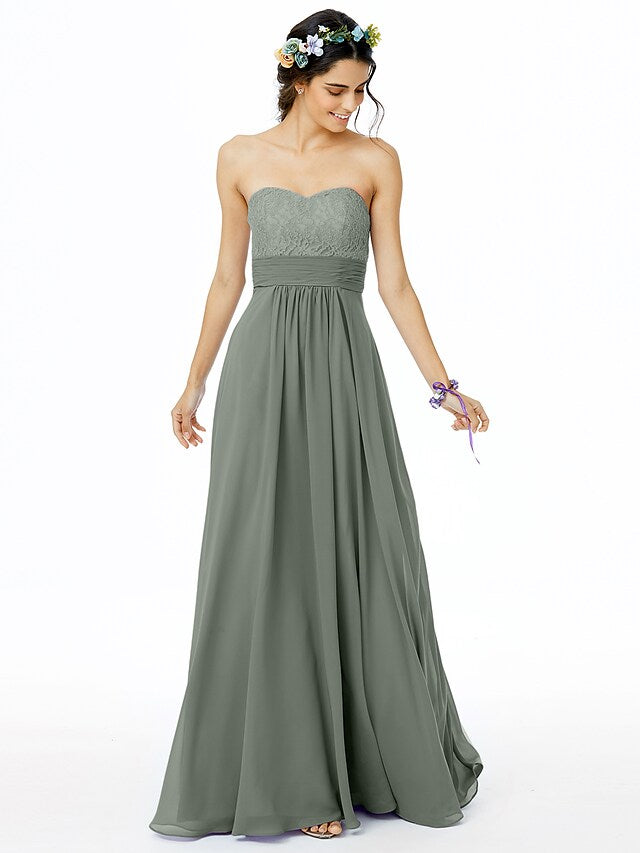 Close-up of intricate lace and ruched detailing on a bridesmaid dress.