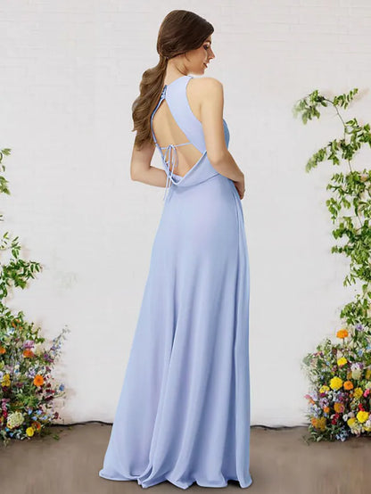 Back view of a woman in a light blue A-line V-neck chiffon bridesmaid dress.