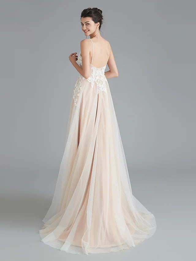 Side view of the V-neck lace gown with intricate beading.