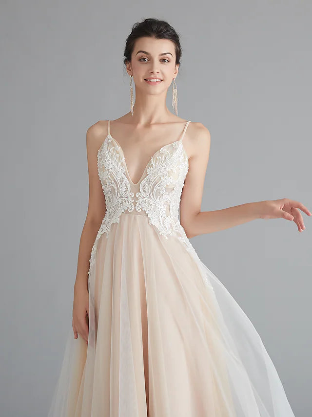 Full length view of the A-line wedding guest dress.