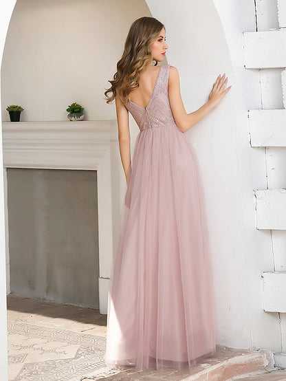 Close-up of the elegant A-line V-neck satin evening gown, highlighting the fabric and sequin sash.