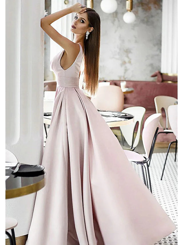 Back view of the A-line satin gown with a sweep train.
