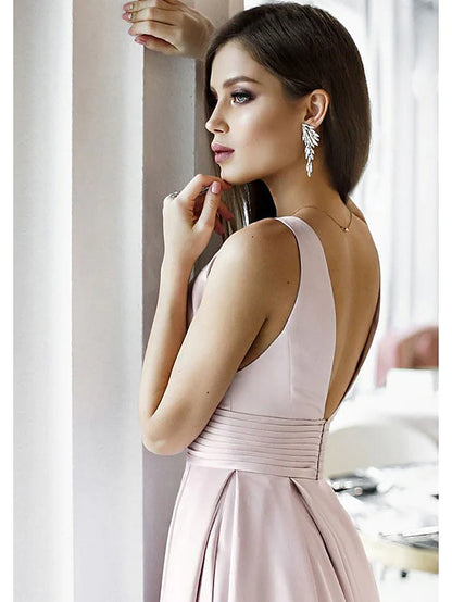Side view of the sleeveless V-neck formal dress with pleats.