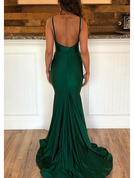 Back view of a champagne satin prom dress showing the sweep train.