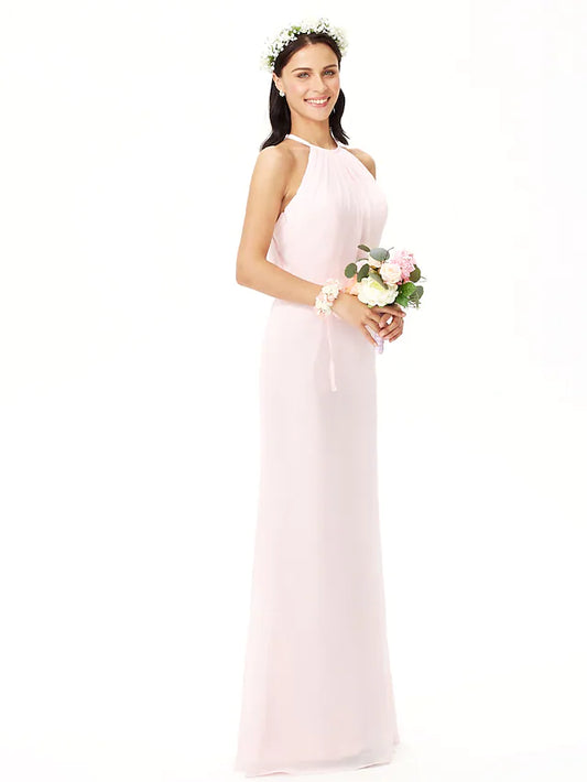 Woman wearing an elegant jewel neck sleeveless chiffon bridesmaid dress with pleats.