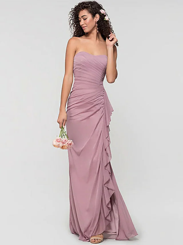 Bridesmaid dress with sweetheart neckline, open back, and ruffles.