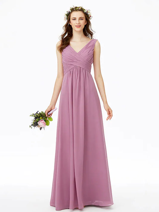 Model wearing a floor-length V-neck chiffon bridesmaid dress with criss-cross pleats.