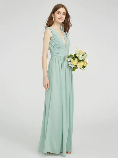Back view of a model in a floor-length V-neck chiffon bridesmaid dress.
