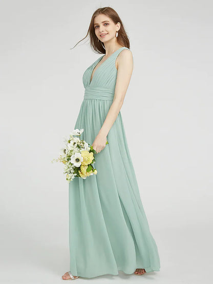 Side view of a model showcasing the ruched detailing on a chiffon bridesmaid dress.