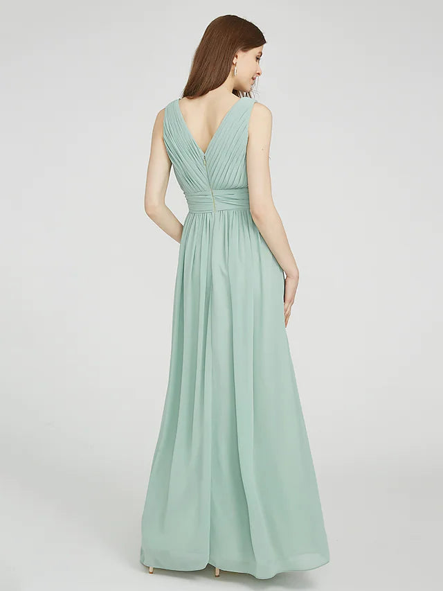 Model posing gracefully in a sleeveless V-neck floor-length bridesmaid gown.