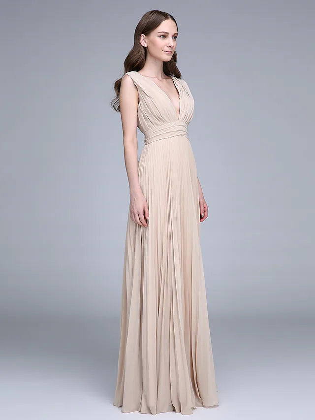 Woman in an elegant V-neck floor-length chiffon bridesmaid dress, front view.