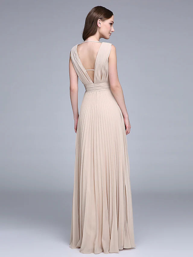 Woman in an elegant V-neck floor-length chiffon bridesmaid dress, side view.