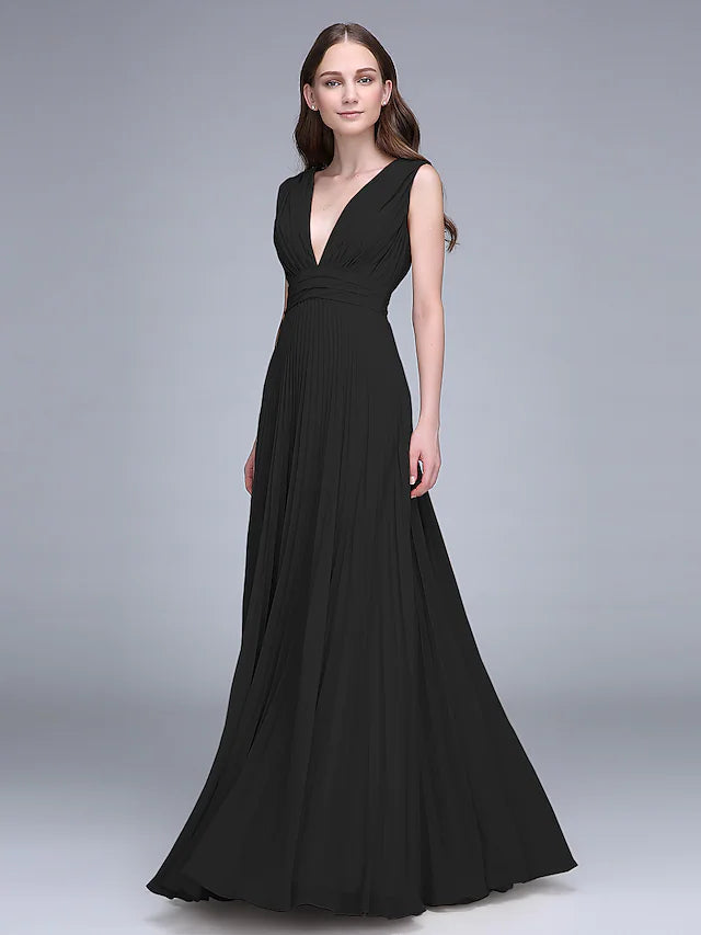Woman in an elegant V-neck floor-length chiffon bridesmaid dress, back view.