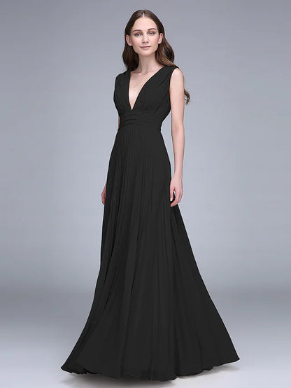 Woman in an elegant V-neck floor-length chiffon bridesmaid dress, back view.