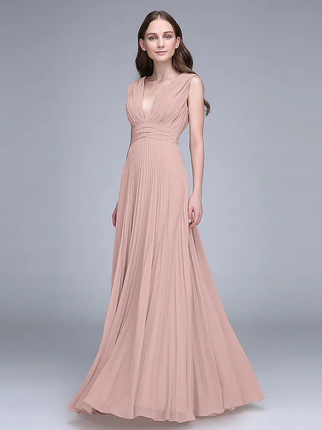Woman in an elegant V-neck floor-length chiffon bridesmaid dress, walking.
