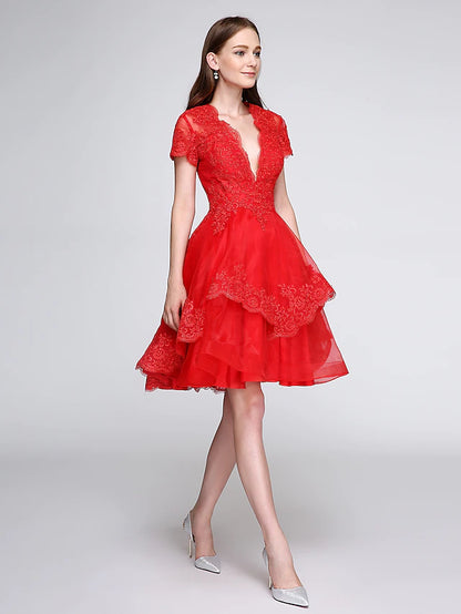 Full view of the elegant knee-length ball gown cocktail dress.