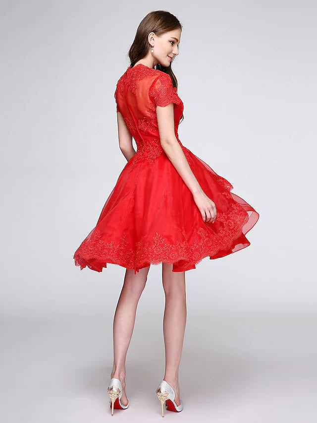Side view of the organza cocktail dress with short sleeves.