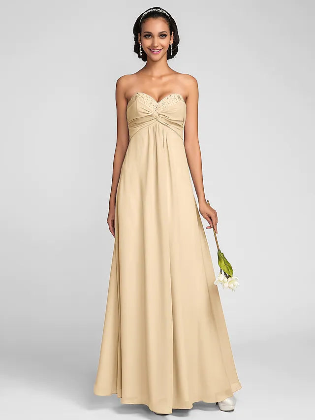 Side profile of a flowing multi-color chiffon bridesmaid dress.