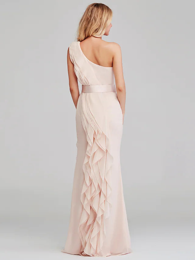 Back view of a model in a one-shoulder long chiffon bridesmaid dress.