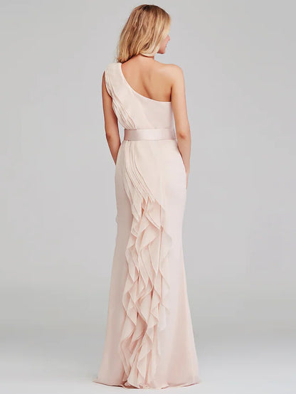 Back view of a model in a one-shoulder long chiffon bridesmaid dress.