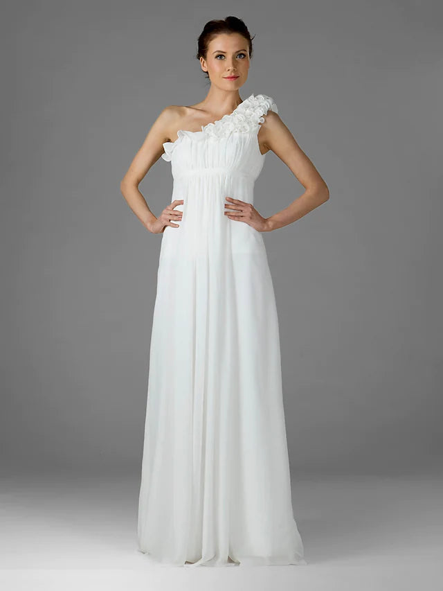 Woman wearing a light-colored one-shoulder floor-length chiffon bridesmaid dress with ruffles and draping.