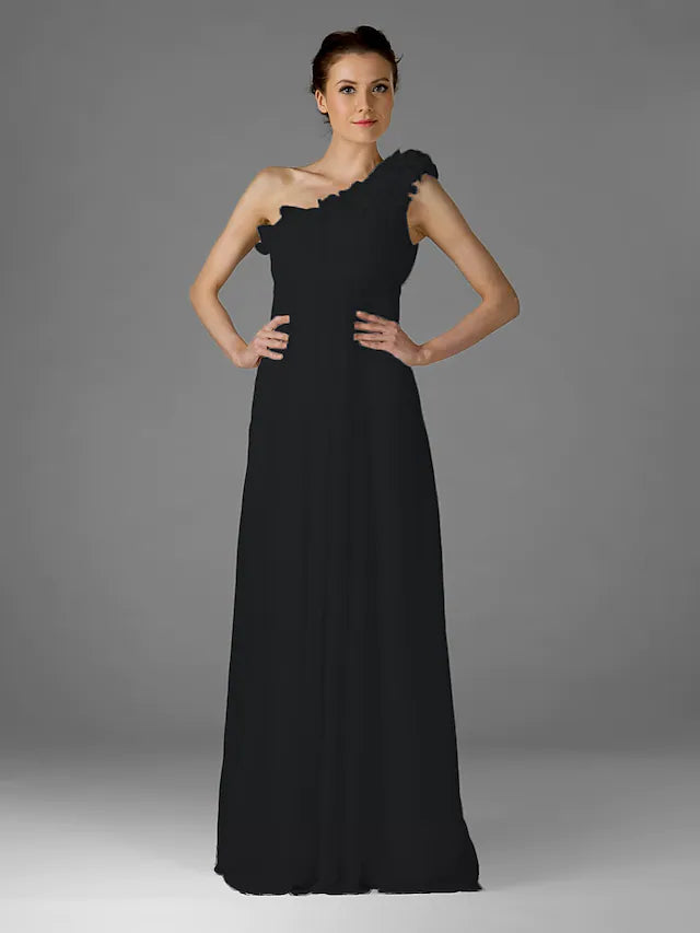 Side view of a woman in a one-shoulder floor-length chiffon bridesmaid dress, showcasing the flowing skirt.