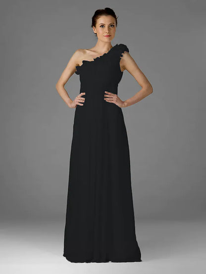Side view of a woman in a one-shoulder floor-length chiffon bridesmaid dress, showcasing the flowing skirt.