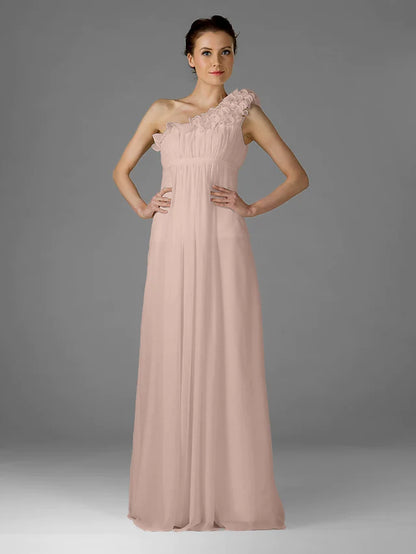 Woman posing elegantly in a one-shoulder floor-length chiffon bridesmaid dress.