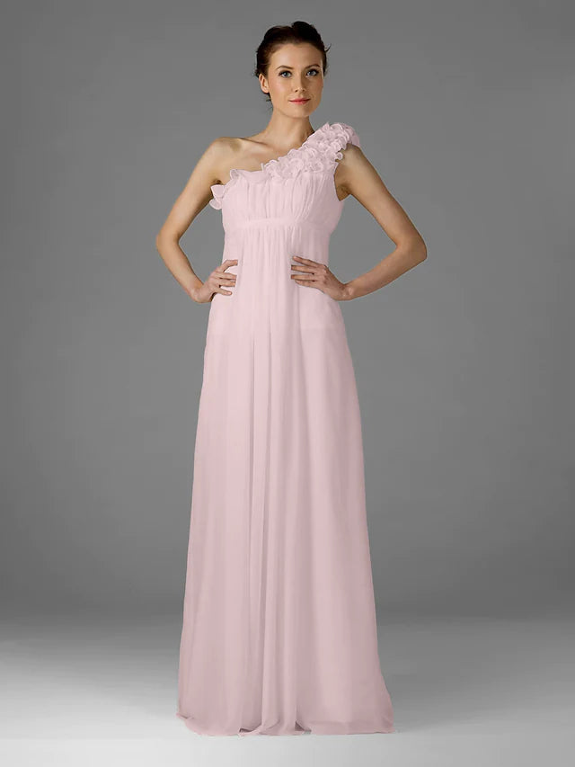 Back view of a woman wearing a one-shoulder floor-length chiffon bridesmaid dress.