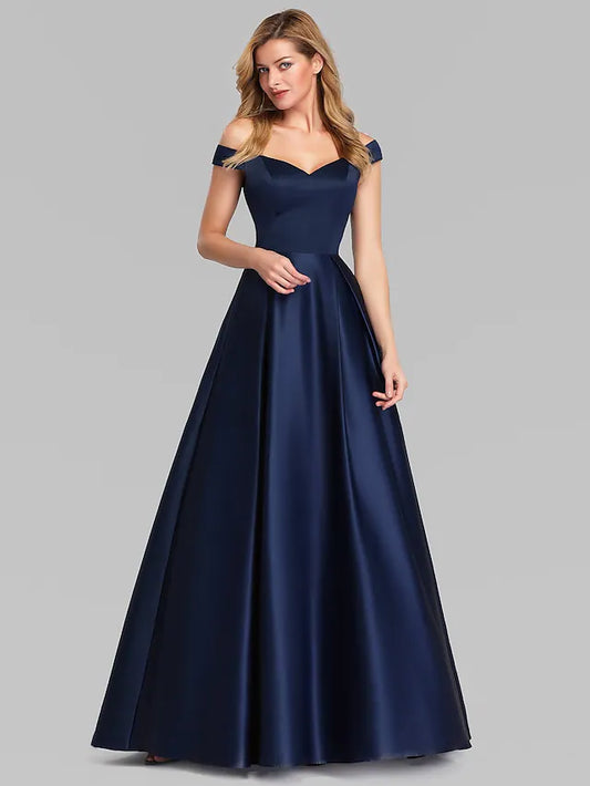Elegant floor-length charmeuse evening gown with plunging neckline and ruched details.
